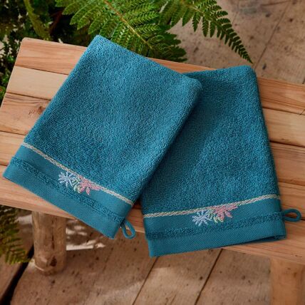 2 gants de toilette