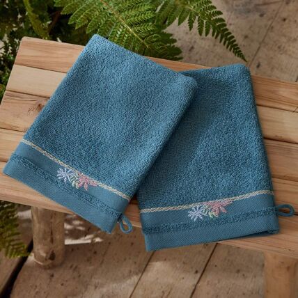2 gants de toilette